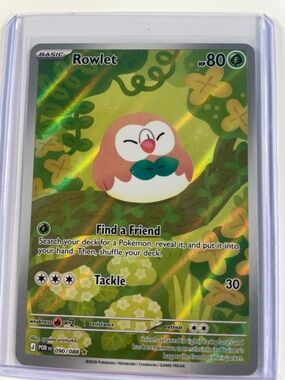 Pokemon Rowlet Holographic Green and Brown Card